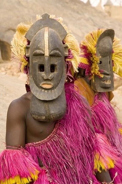 Portrait of masked ceremonial Dogon dancers near Sangha, Bandiagara escarpment
