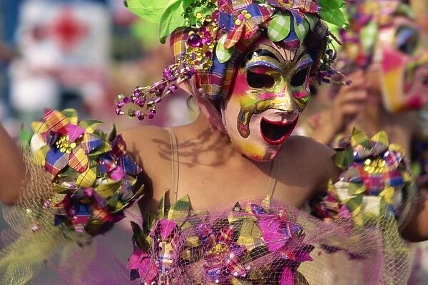 Portrait of a masked dancer at Mardi Gras carnival