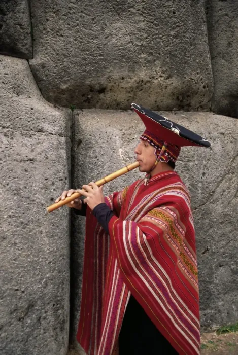 Framed Print : Portrait of a Peruvian man playing a flute Framed Print : Portrait of a Peruvian man playing a flute