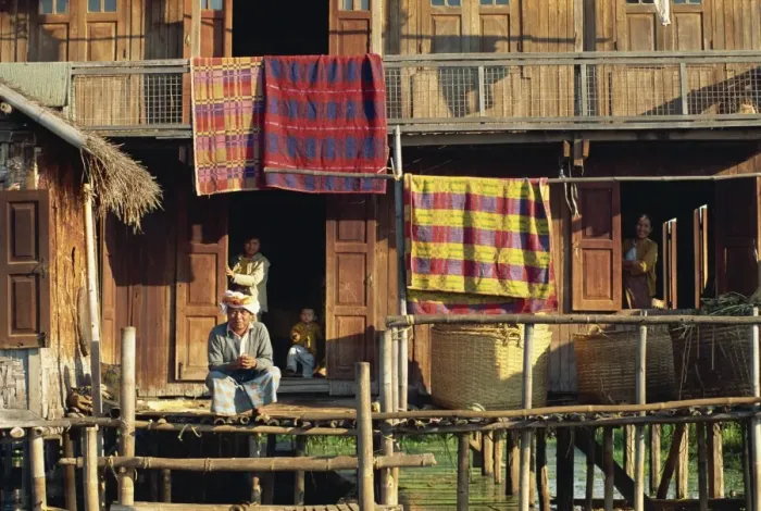 Framed Print : Portrait of a Shah family and a detail of their house on stilts, Inle Lake Framed Print : Portrait of a Shah family and a detail of their house on stilts, Inle Lake