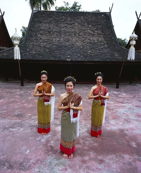 Portrait of three women in traditional Thai costume