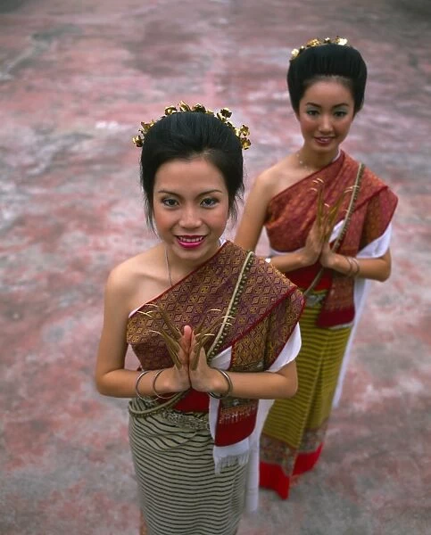 Portrait of two women in traditional Thai costume