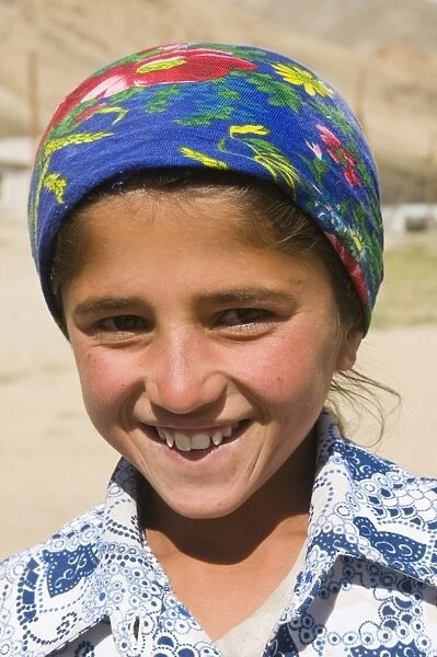 Portrait of a young smiling woman, Shokh Dara Valley, Tajikistan, Central Asia, Asia