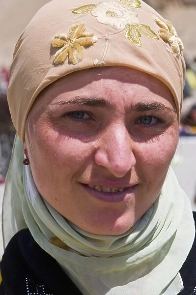 Portrait of young woman with headscarf, Ishkashim, Tajikistan, Central Asia, Asia