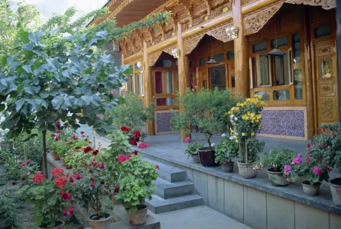 Framed Print : Pot plants, garden, and wooden Sala architecture in the north east of Qinghai Framed Print : Pot plants, garden, and wooden Sala architecture in the north east of Qinghai