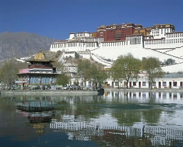 The Potala Palace, UNESCO World Heritage Site, and lake in Lhasa, Tibet, China, Asia