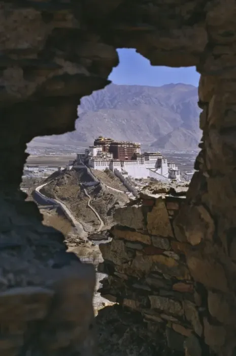 Framed Print : Potala Palace, UNESCO World Heritage Site, seen through ruined fort window Framed Print : Potala Palace, UNESCO World Heritage Site, seen through ruined fort window