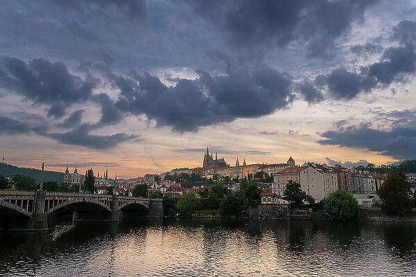 Prague Castle and Manes Bridge at dusk, Prague, Bohemia, Czech Republic (Czechia), Europe
