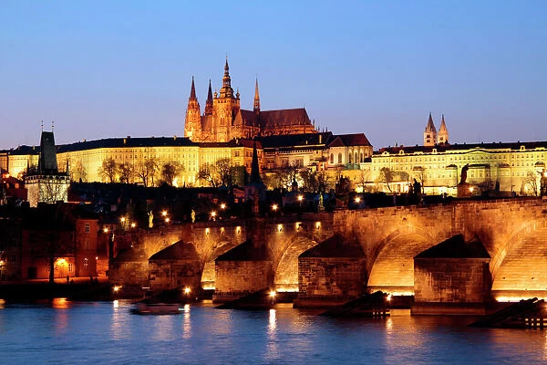 Prague Castle on the skyline and the Charles Bridge over the River Vltava