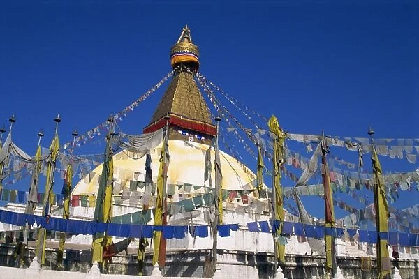 Prayer flags around the dome of one of the world s