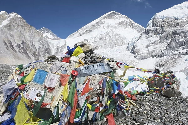 Prayer flags at the Everest Base Camp sign, Solu Khumbu Everest Region