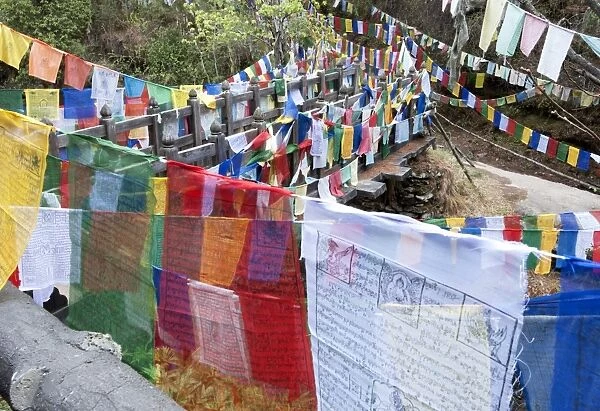 Prayer flags at Mebar Tsho, The Burning Lake, where Pema Lingpa is said to have held