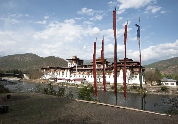 Prayer flags by Punakha dzong (monastery), at the confluence of the Pho chu (Father) and Mo Chu