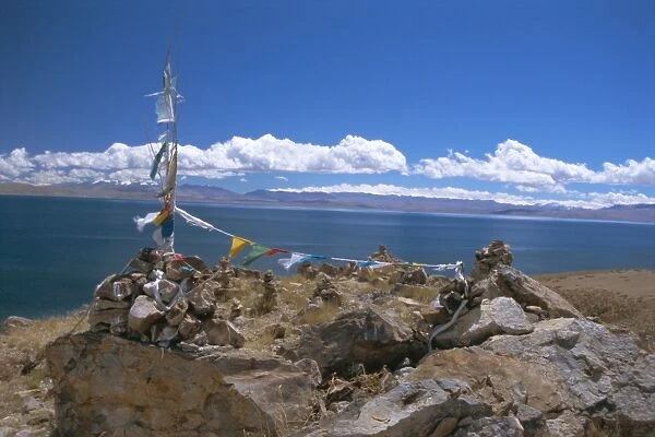 Prayer flags over sky burial site, Lake Manasarovar (Manasarowar), sacred lake just south of Kailas (Kailash), Tibet