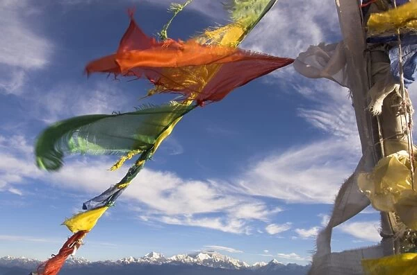 Prayer flags with snowy Kangchendzonga beyond in morning light