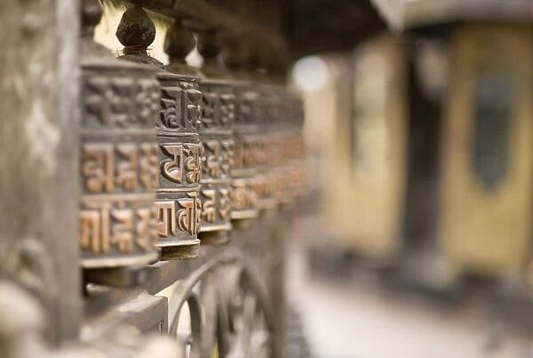Prayer wheels, Swayambhu (Monkey Temple), Kathmandu, Nepal, Asia