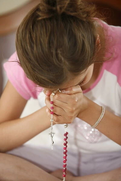 Praying girl, France, Europe
