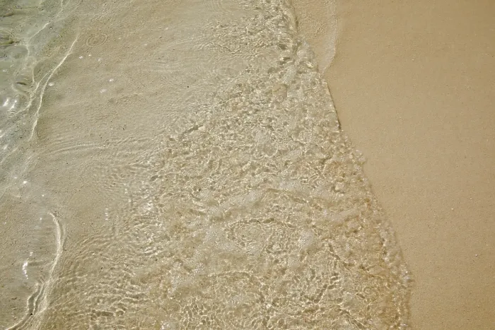 Framed Print : Pristine shallow waters lap against the white coral sand of a tropical beach; Havodda Island, Gaafu Dhaalu atoll, Maldives Framed Print : Pristine shallow waters lap against the white coral sand of a tropical beach; Havodda Island, Gaafu Dhaalu atoll, Maldives