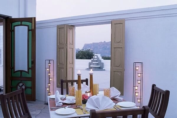 Private dining outside a bedroom suit with view of