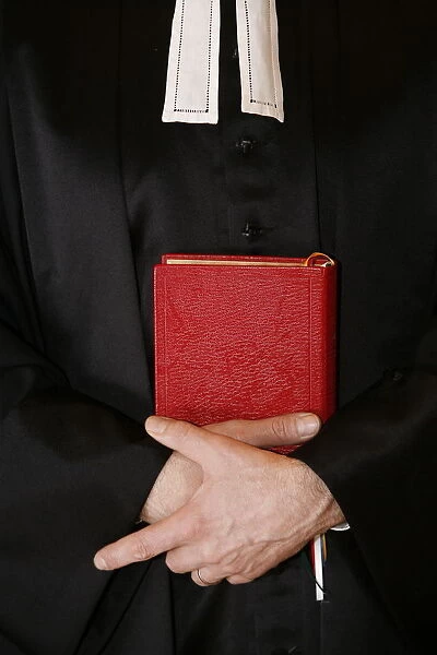 Protestant minister holding Bible, Paris, Ile de France, France, Europe