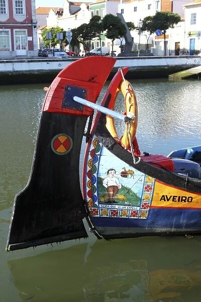 Prow of a colourful, handpainted Moliceiro boat used for sightseeing trips along the canals of Aveiro, Beira Litoral