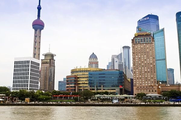 Pudong skyline across the Huangpu River, Oriental Pearl tower on left, Shanghai, China, Asia