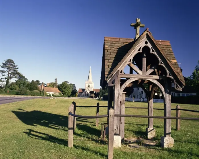 Framed Print : Pump, village green and church in the distance, Brockham, near Dorking Framed Print : Pump, village green and church in the distance, Brockham, near Dorking