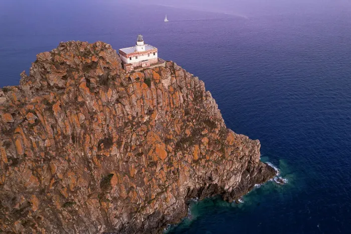 Framed Print : Punta della Guardia basalt cliff with the lighthouse at dusk, Ponza island, Tyrrhenian Sea, Pontine islands, Latina Province, Latium (Lazio), Italy, Europe