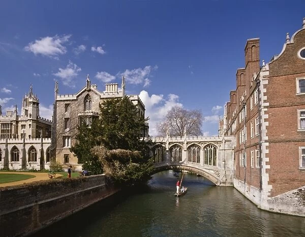 Punting under the Bridge of Sighs on the River Cam at St. Johns College