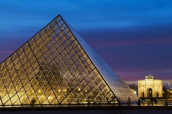The Pyramid of the Louvre at night, Paris, France, Europe