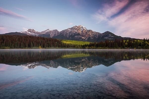 Pyramid Mountain reflected in Patricia Lake in autumn at sunrise, Jasper National Park