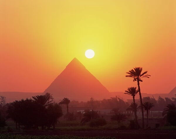 Pyramid silhouetted at sunset, Giza, UNESCO World Heritage Site, Cairo