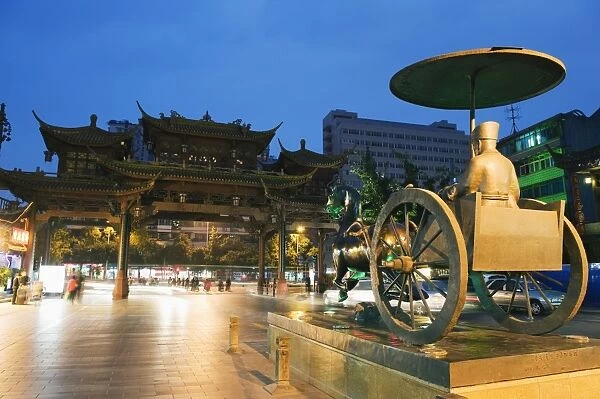 Qintai street statue and Chinese gate, Chengdu, Sichuan Province, China, Asia