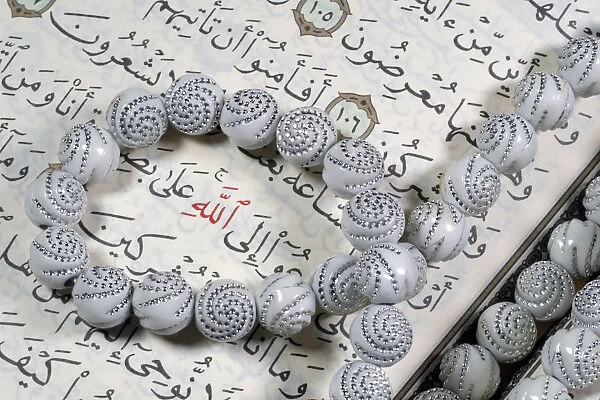 Quran and Tasbih (prayer beads), with Allah monogram in red, Haute-Savoie, France, Europe