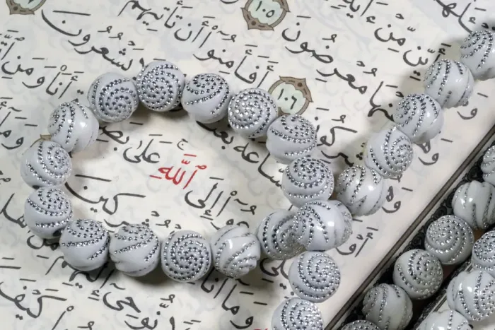 Framed Print : Quran and Tasbih (prayer beads), with Allah monogram in red, Haute-Savoie, France, Europe Framed Print : Quran and Tasbih (prayer beads), with Allah monogram in red, Haute-Savoie, France, Europe