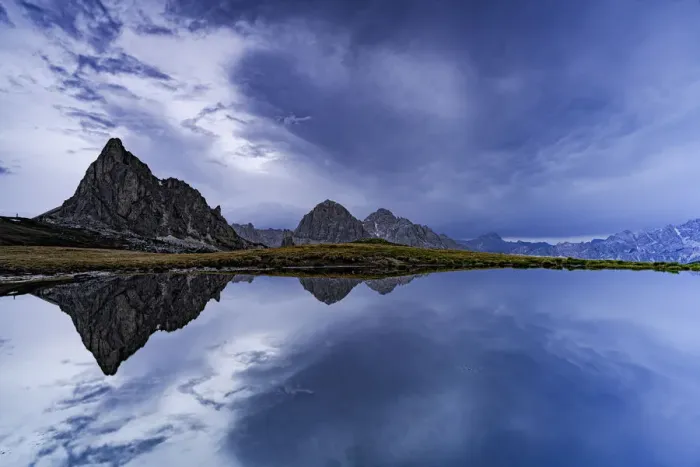Framed Print : Ra Gusela and Tofane mountain peaks reflected in water under the cloudy sky at dusk, Giau Pass, Dolomites, Veneto, Italy, Europe Framed Print : Ra Gusela and Tofane mountain peaks reflected in water under the cloudy sky at dusk, Giau Pass, Dolomites, Veneto, Italy, Europe