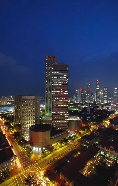 Raffles Hotel at Night and Skyline, Singapore, Asia