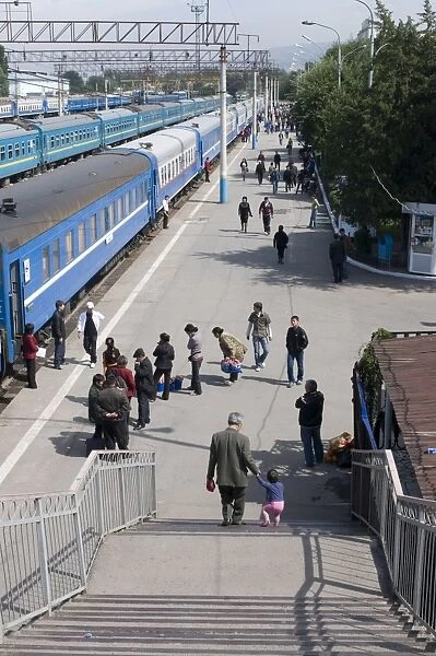 Railway station with passengers and trains, Almaty, Kazakhstan, Central Asia, Asia