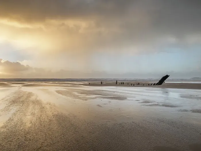 Framed Print : Rain sweeping across Rhossili at sunset showing the shipwreck of the Helvetia, Rhossili, Gower, South Wales, United Kingdom, Europe Framed Print : Rain sweeping across Rhossili at sunset showing the shipwreck of the Helvetia, Rhossili, Gower, South Wales, United Kingdom, Europe