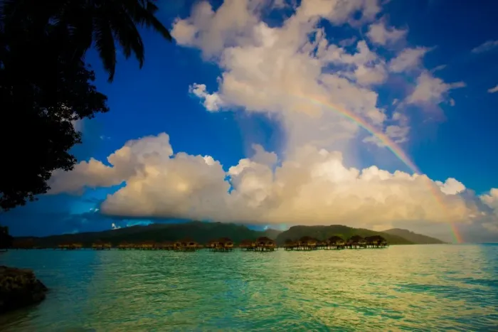 Framed Print : Rainbow arcing over the overwater bungalows, Le Taha a Resort, Tahiti, French Polynesia