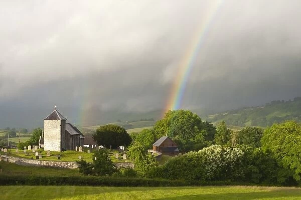 A rainbow over St. Davids Church in the tiny Welsh hamlet of Llanddewir Cwm, Powys