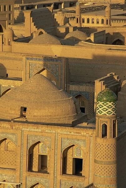 Rakhim Khan Madrasah with Tash Khauli Palace beyond, Khiva, Uzbekistan