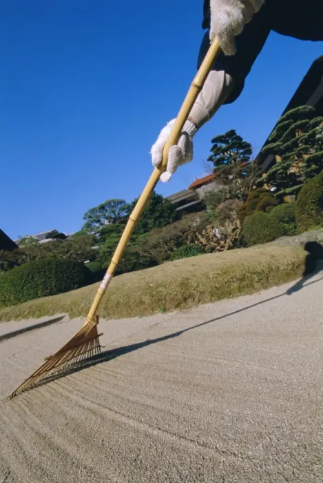 Framed Print : Raking gravel garden Framed Print : Raking gravel garden