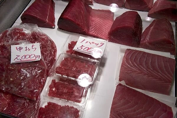 Raw maguro (tuna sashimi) for sale at Tsukiji Wholesale Fish Market, the worlds largest fish market in Tokyo