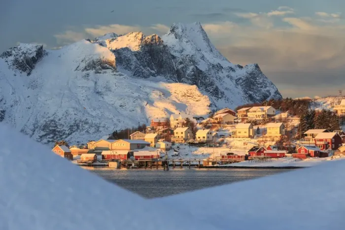 Framed Print : The last rays of sun on the fishing village and the snowy peaks, Kvalvika, Andoya Framed Print : The last rays of sun on the fishing village and the snowy peaks, Kvalvika, Andoya