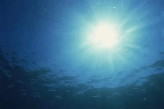 Framed Print : Rays of sunlight through the surface from underwater Framed Print : Rays of sunlight through the surface from underwater