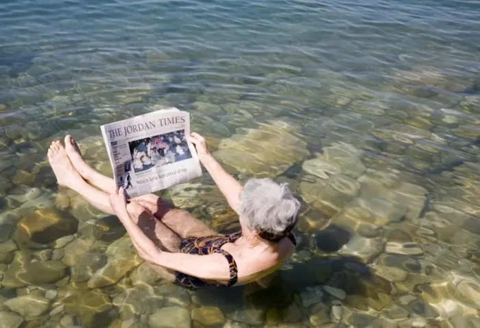 Framed Print : Reading newspaper floating in Dead Sea Framed Print : Reading newspaper floating in Dead Sea