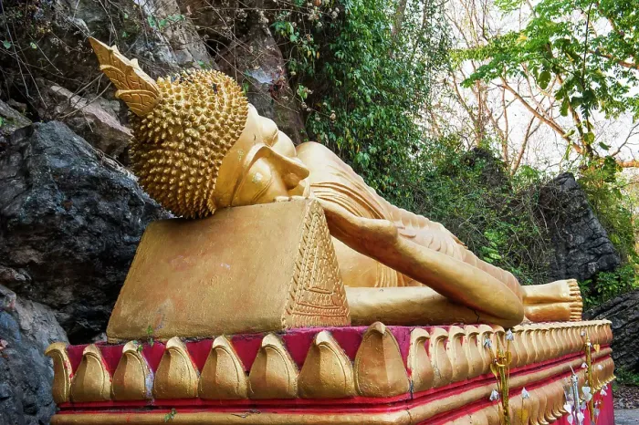 Framed Print : Reclining Buddha statue on the path to the stupa of Wat Chom Si on the summit of Mount Phu Si, Luang Prabang, northern Laos Framed Print : Reclining Buddha statue on the path to the stupa of Wat Chom Si on the summit of Mount Phu Si, Luang Prabang, northern Laos