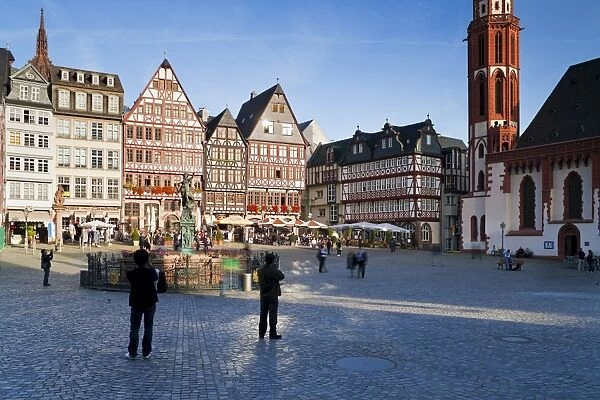Reconstructed half-timbered buildings and the Gerechtigkeitsbrunnen statue in Romerberg Square