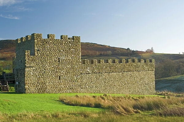 Part reconstruction of wall and tower at Roman settlement and fort at Vindolanda